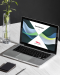 Aufgeklappter Apple Laptop auf dem der UXMA Trend Report 2026 zu sehen ist.