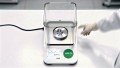 The picture shows a laboratory scale with a display that shows the current value of the substances being measured.